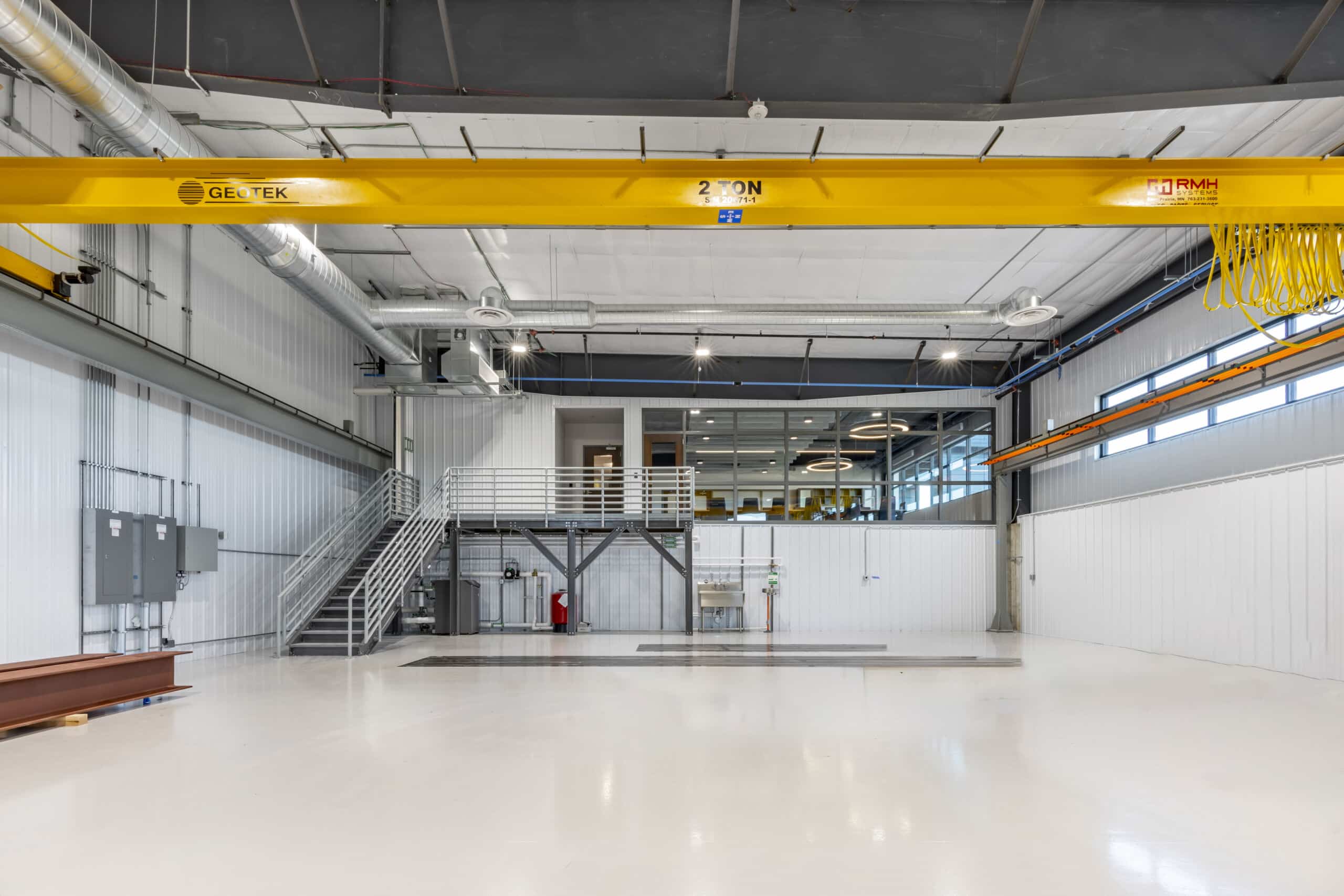 Heavy-duty industrial overhead crane system installed in a modern manufacturing plant